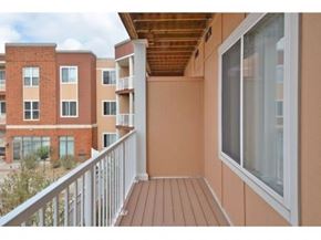 Rosemount apartment for rent - a balcony with a wooden roof