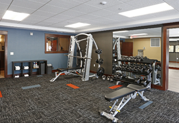 V2 apartments free weights & bench
