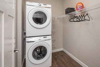 A washer and dryer in a laundry room