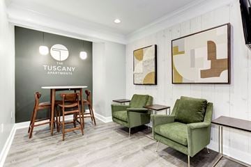 Alexandria apartment for rent - a living room with a table and chairs and a dining room