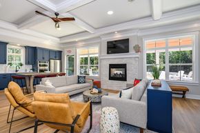 Easton apartment for rent - A living room with a fireplace and a television at The Promenade at Easton Apartments, Easton, 21601