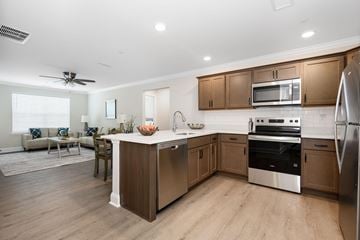 Easton apartment for rent - A modern kitchen with wooden cabinets and stainless steel appliances.