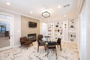 Pikesville apartment for rent - Living Area With Fireplace at Vivant Woodholme, Pikesville, MD, 21208