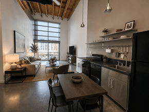Sacramento apartment for rent - A modern kitchen with a dining table and chairs.
