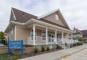 Waterloo townhouse for rent - A house with a sign that says "CommonBond MERCY ADVANTAGE CENTER".