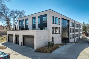 Minneapolis apartment for rent - A modern building with a mix of white and black exterior.