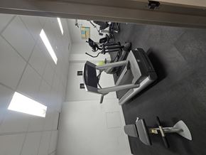 Marshalltown apartment for rent - A gym with a treadmill and exercise equipment.