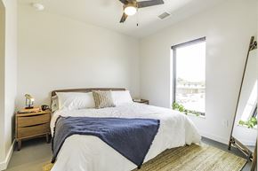 Springdale apartment for rent - Studio, one and two bedroom apartment homes with stainless steel appliances, quartz countertops, backlit mirrors and large windows at 202 Railside in Springdale, AR