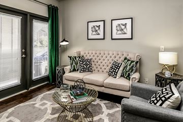 Bellevue apartment for rent - A living room with a white sofa and a coffee table.