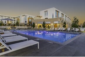 Bentonville apartment for rent - Sparkling pool and sundeck at Crystal Flats in Bentonville, AR