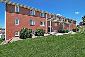 Omaha apartment for rent - our apartments offer a spacious courtyard with green grass