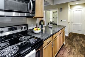 Omaha apartment for rent - Kitchens with stainless steel appliances at The Larimore Apartments, Omaha, NE 68164