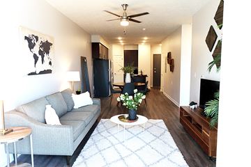 Omaha apartment for rent - a living room with a couch and a table