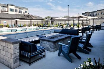 Outdoor lounge with fire pits and grilling stations