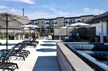 Outdoor lounge with fire pits and grilling stations