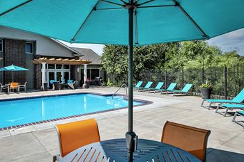 Relaxing pool area with sundeck