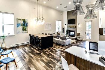 Spacious clubhouse with wood plank flooring