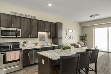 Des Moines apartment for rent - our apartments offer a kitchen and living room with a table