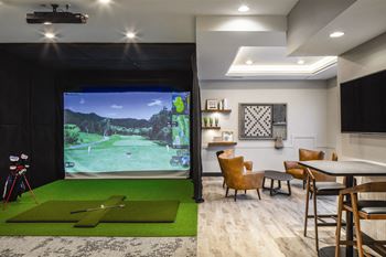 Game room with golf simulator