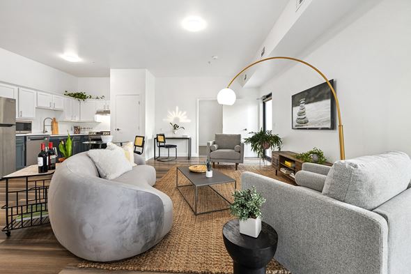 Bentonville apartment for rent - Upscale studio, one, and two-bedroom apartment homes featuring two-tone kitchen cabinetry, quartz countertops, stainless steel appliances, luxury vinyl wood flooring, and much more at Parkside Apartments and Shops in Bentonville, AR