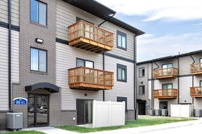Grand Island apartment for rent - Property Exterior with Patio and Balconies at Residences at Oak Pointe in Grand Island, NE