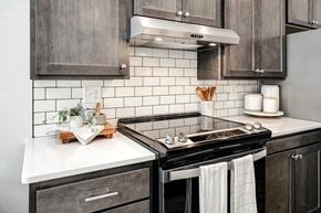 Council Bluffs apartment for rent - Modern one- and two-bedroom apartments featuring stainless steel appliances, high-end lighting, premium LVT flooring, granite countertops and more at The Ridgeline in Council Bluffs, IA