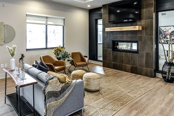 Lounge with fireplace and tv