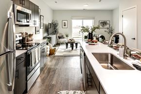 Omaha apartment for rent - Studio, one two and three bedroom apartments and townhomes featuring open concept floor plans, dens, large windows, stainless steel appliances, quartz countertops, eat-in kitchens, pantries, LVT flooring and much more at The Trails at North Streams in Omaha, NE