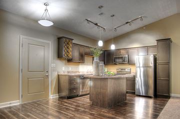 Lincoln townhouse for rent - a kitchen with stainless steel appliances and a counter top