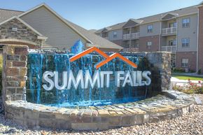 Lincoln townhouse for rent - a sign that says summit falls with an orange arrow on it