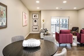 Bellevue apartment for rent - Vue 19 (Model 2Bd)- Modern dining room with a round table and chairs.
