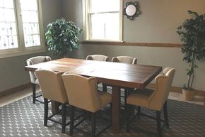 Omaha apartment for rent - a dining room with a wooden table and chairs
