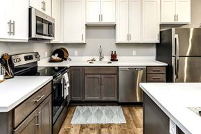 Omaha apartment for rent - Two tone shaker cabinets with large kitchens at Echo Park in Omaha, NE