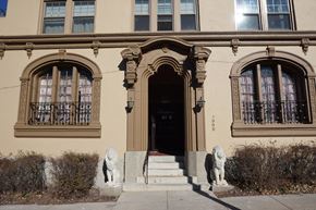 Omaha apartment for rent - the front of a building with two lions in front of it
