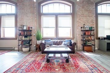 Omaha apartment for rent - a living room with a couch and a coffee table
