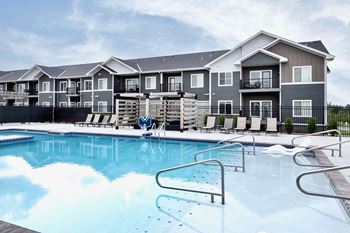 Heated outdoor pool with outdoor entertaining area