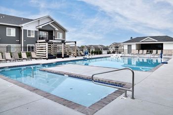 Heated outdoor pool with outdoor entertaining area