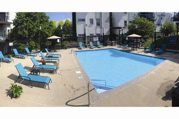 Swimming pool with relaxing sundecks
