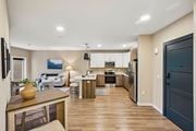 Easton apartment for rent - A modern kitchen with a dining table and chairs.