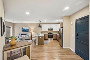 Easton apartment for rent - A modern kitchen with a dining table and chairs.