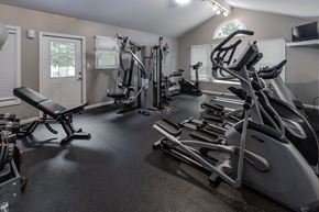 Emmaus apartment for rent - A gym with treadmills, elliptical machines, and other exercise equipment. at Meadows Apartments, Pennsylvania, 18049