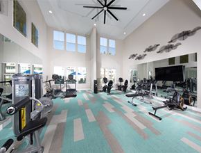 Surprise apartment for rent - a fitness center with workout machines and equipment at a senior apartment community