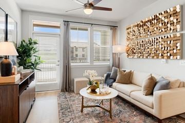 Chandler apartment for rent - a living room with a white couch and a coffee table