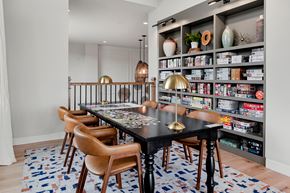 Mesa apartment for rent - a dining room with a table and chairs and a bookshelf