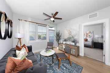 Glendale apartment for rent - a living room with a couch and a ceiling fan