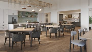 Apopka apartment for rent - A modern kitchen with a dining table and chairs.