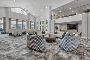 Katy apartment for rent - a living room with couches and chairs and a fireplace