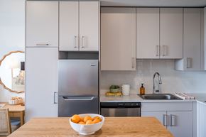 Naples apartment for rent - A kitchen with a bowl of oranges on the table.at The Teale Golden Gate in Naples, FL, 34116