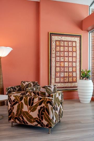 Naples apartment for rent - A living room with a sofa and a lamp.