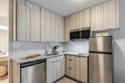 Kissimmee apartment for rent - our apartments offer a modern kitchen with stainless steel appliances at The Teale, Kissimmee, FL, 34746